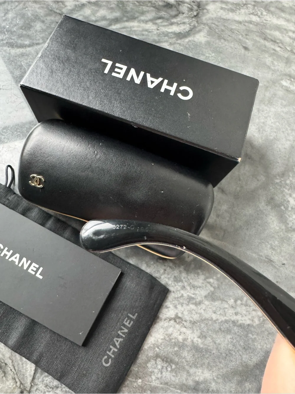 CHANEL Black Sunglasses with Gold Logo Accent